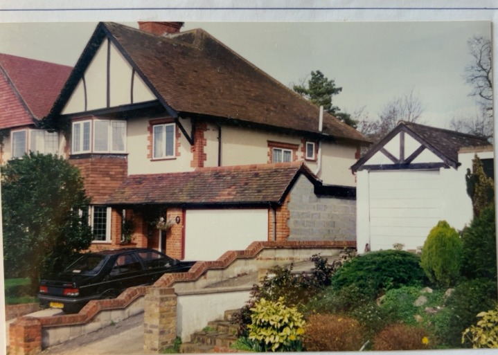 Original archive photograph: the completed attached garage, porch and utility room at a semi-detached house in Coulsdon, the new tiled roof matching the tiles on the existing house