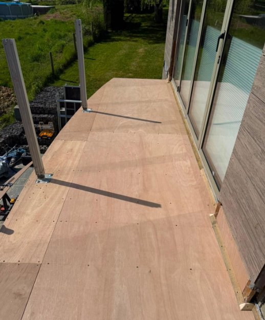Completed new balcony deck with balustrade posts in place